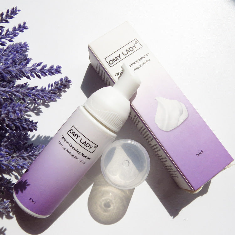 OMY LADY Cleansing Mousse 50ml shown with cap off and box beside, emphasizing its foaming texture for deep cleansing and blackhead removal.